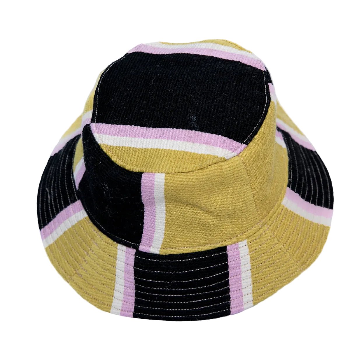 A striped bucket hat made from mixed fabric panels, featuring black corduroy, mustard yellow knit, and pink and white stripes.